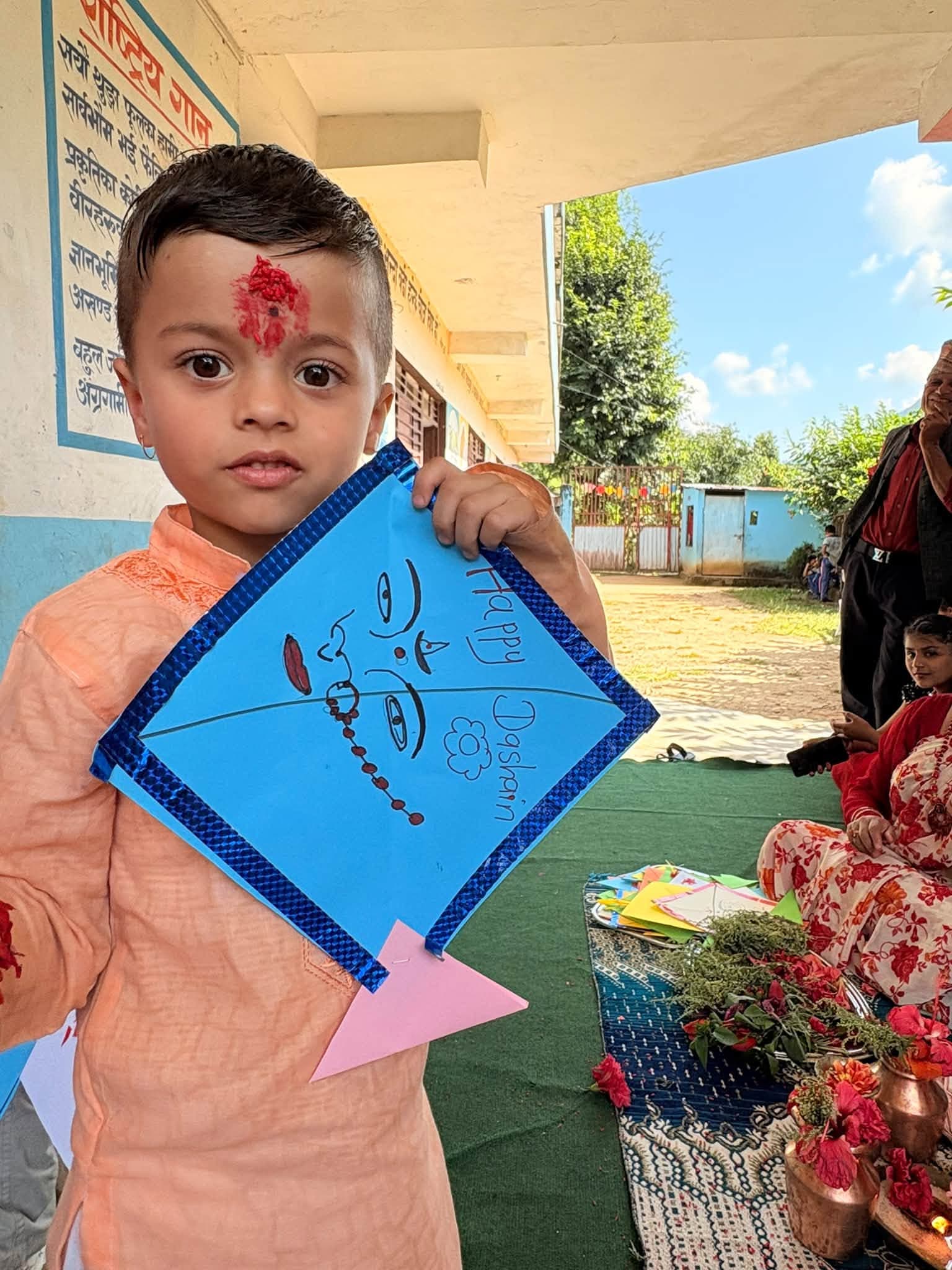 A student with a Dashain kite